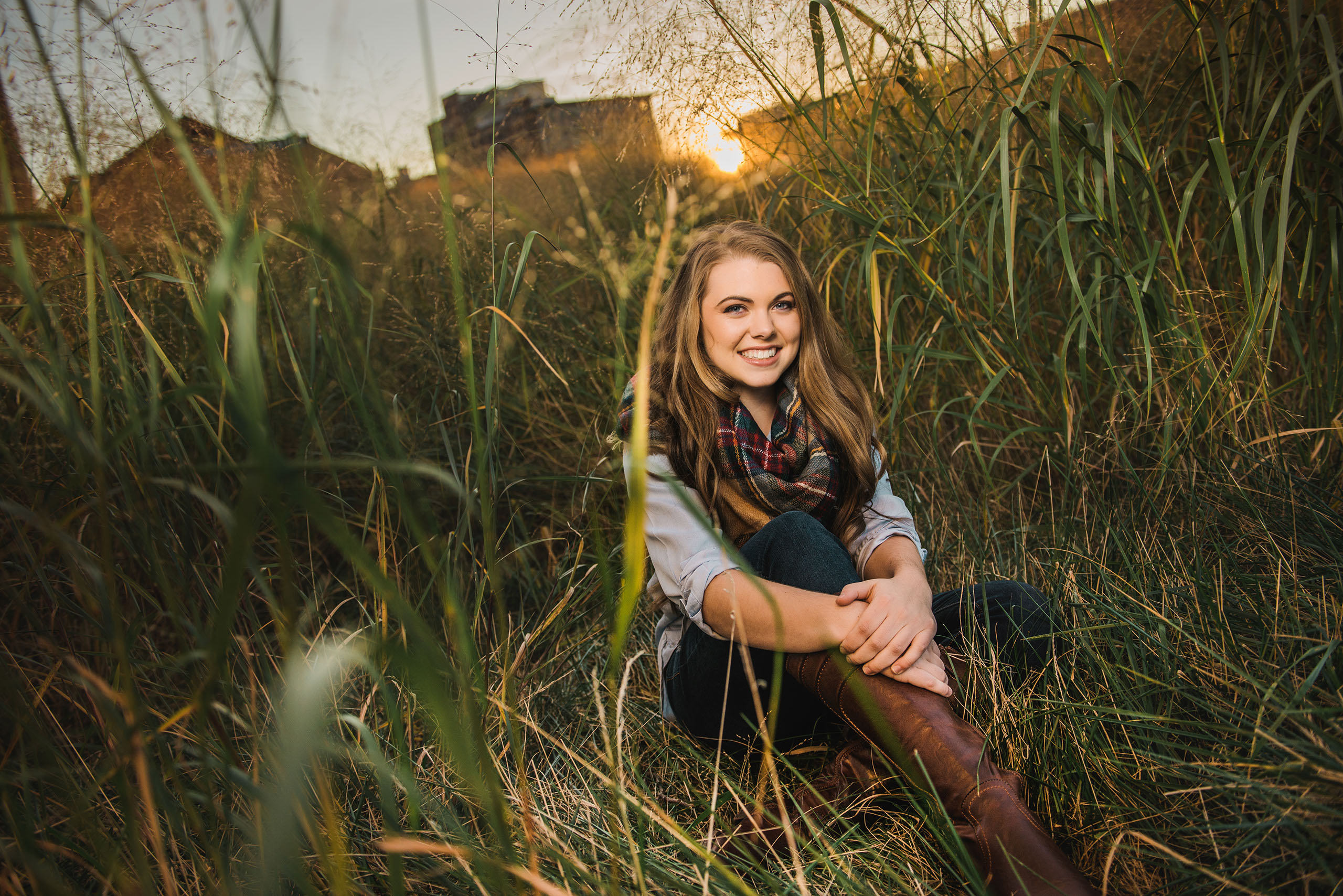 A Senior photo of Anthony Wayne High School student, Kelsey, posing with an Elephant at the Toledo Lucas County Fair.